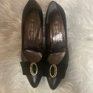 Bruno Magli Size 8AA black shoes with gold rhinestones and a bow in front